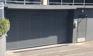 a garage door with a sign